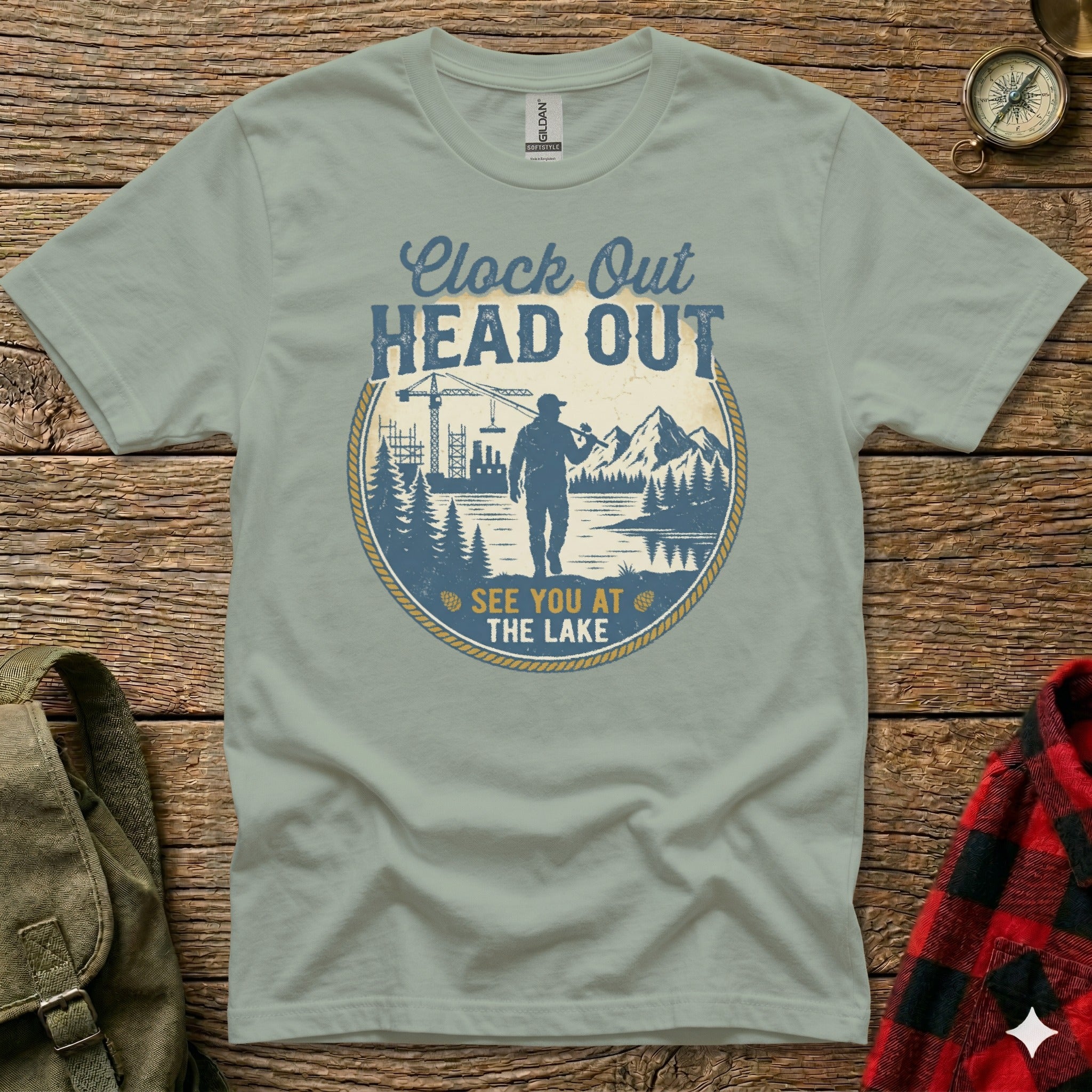 T-shirt with "Clock Out Head Out See You at the Lake" graphic.