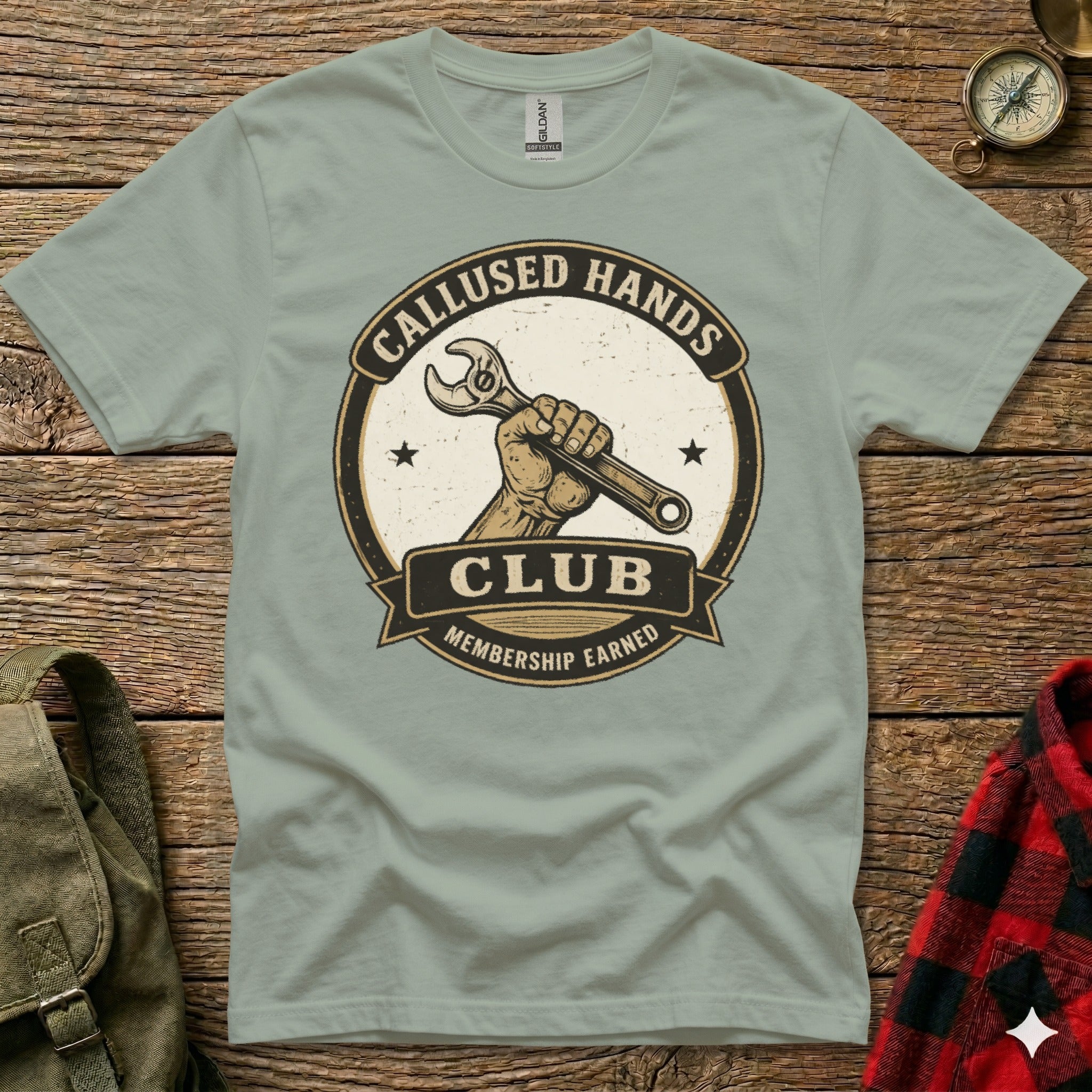 "Callused Hands Membership Earned" club logo on a light green t-shirt.