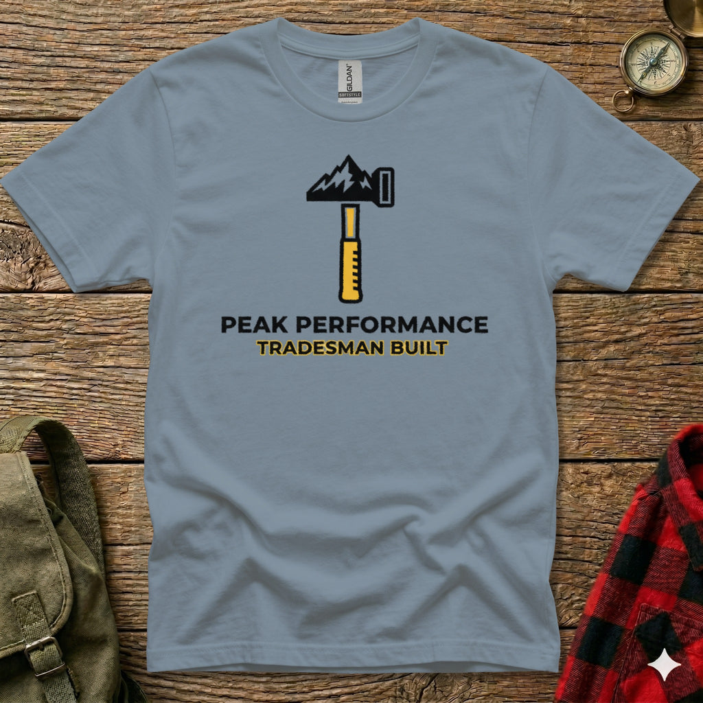 Grey t-shirt with hammer logo and "PEAK PERFORMANCE TRADESMAN BUILT" text.