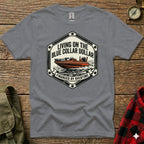 Gray t-shirt with a hexagonal logo featuring a boat and text.