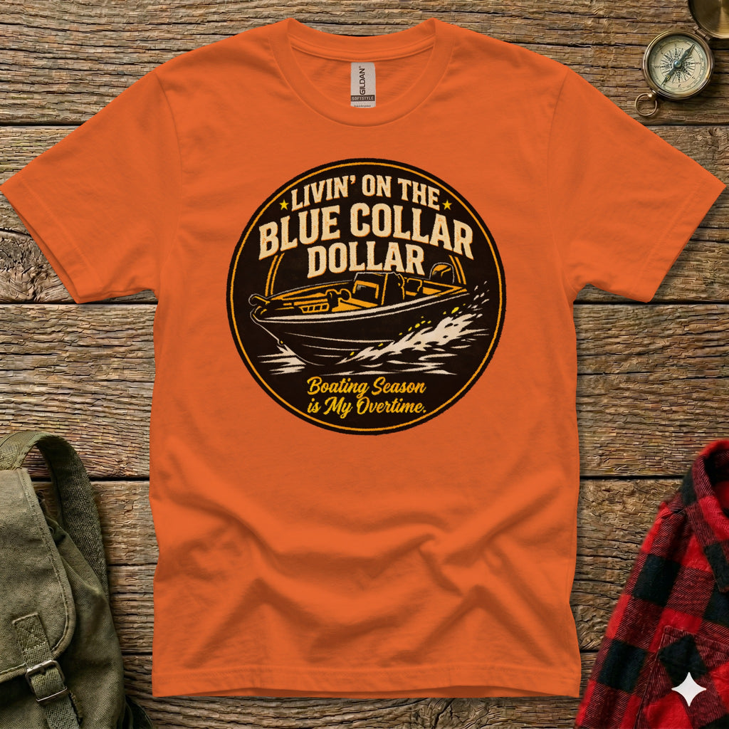 Orange t-shirt graphic with boat and text "Livin' on the Blue Collar Dollar".