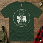 Green t-shirt with "Earn Your Quiet" and "Ironwood Frontier" text and mountain logo.