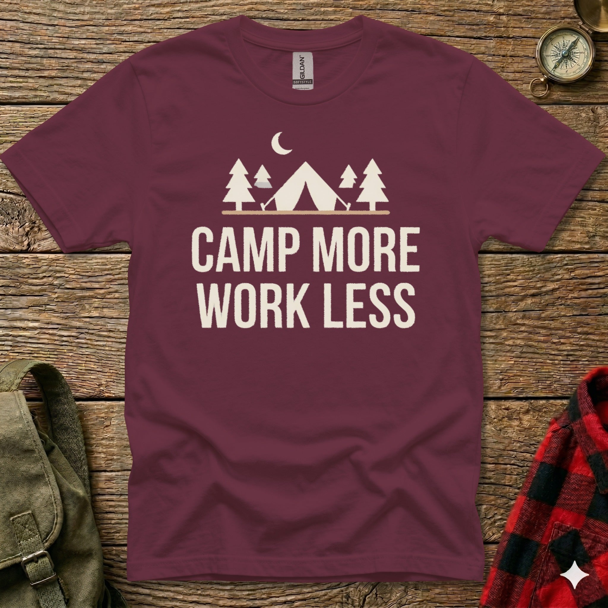 Maroon t-shirt with "Camp More Work Less" text and tent graphic.