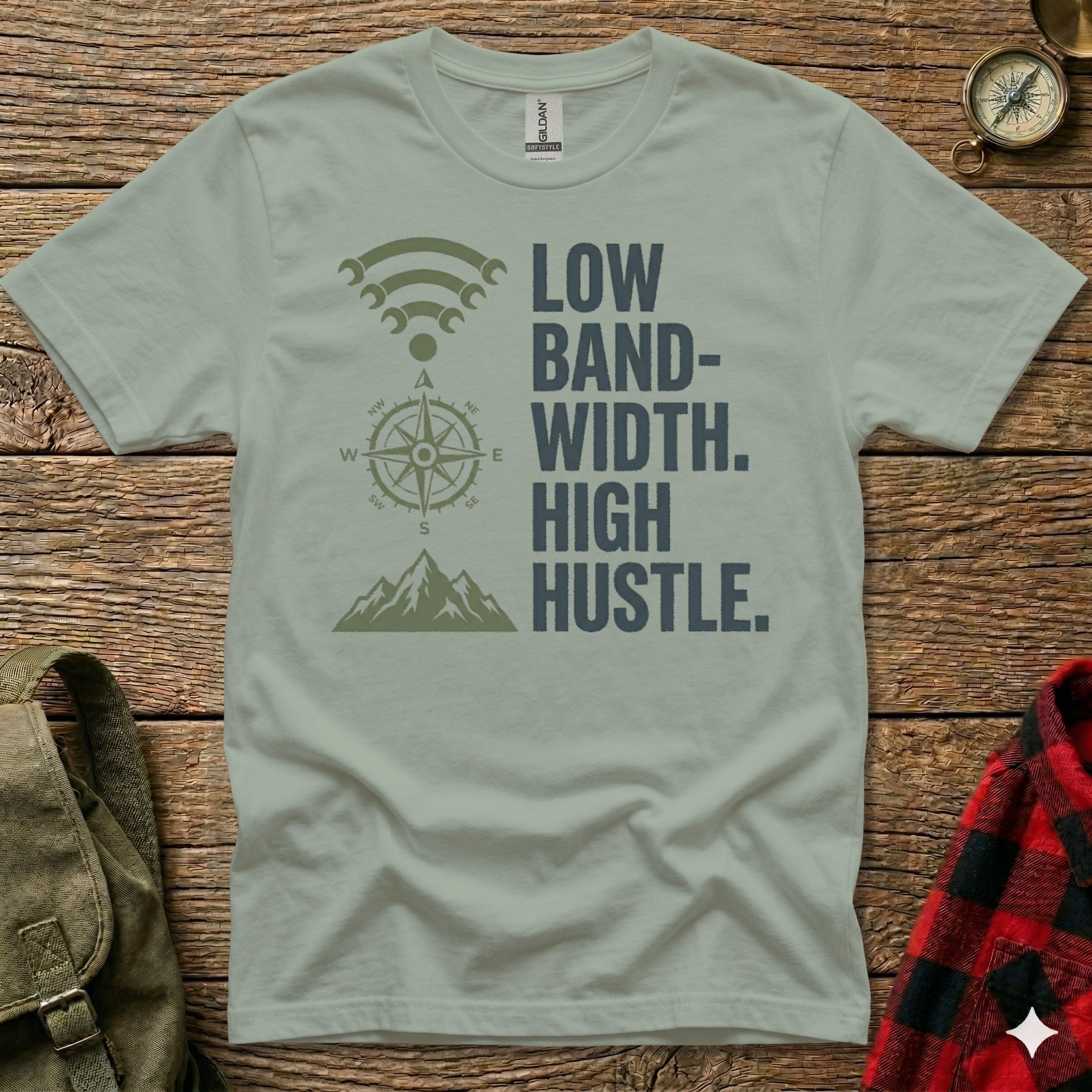 Green t-shirt with "LOW BAND- WIDTH. HIGH HUSTLE." text and compass graphic.