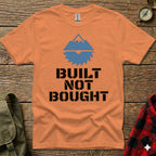 Orange t-shirt with "BUILT NOT BOUGHT" text and mountain graphic.