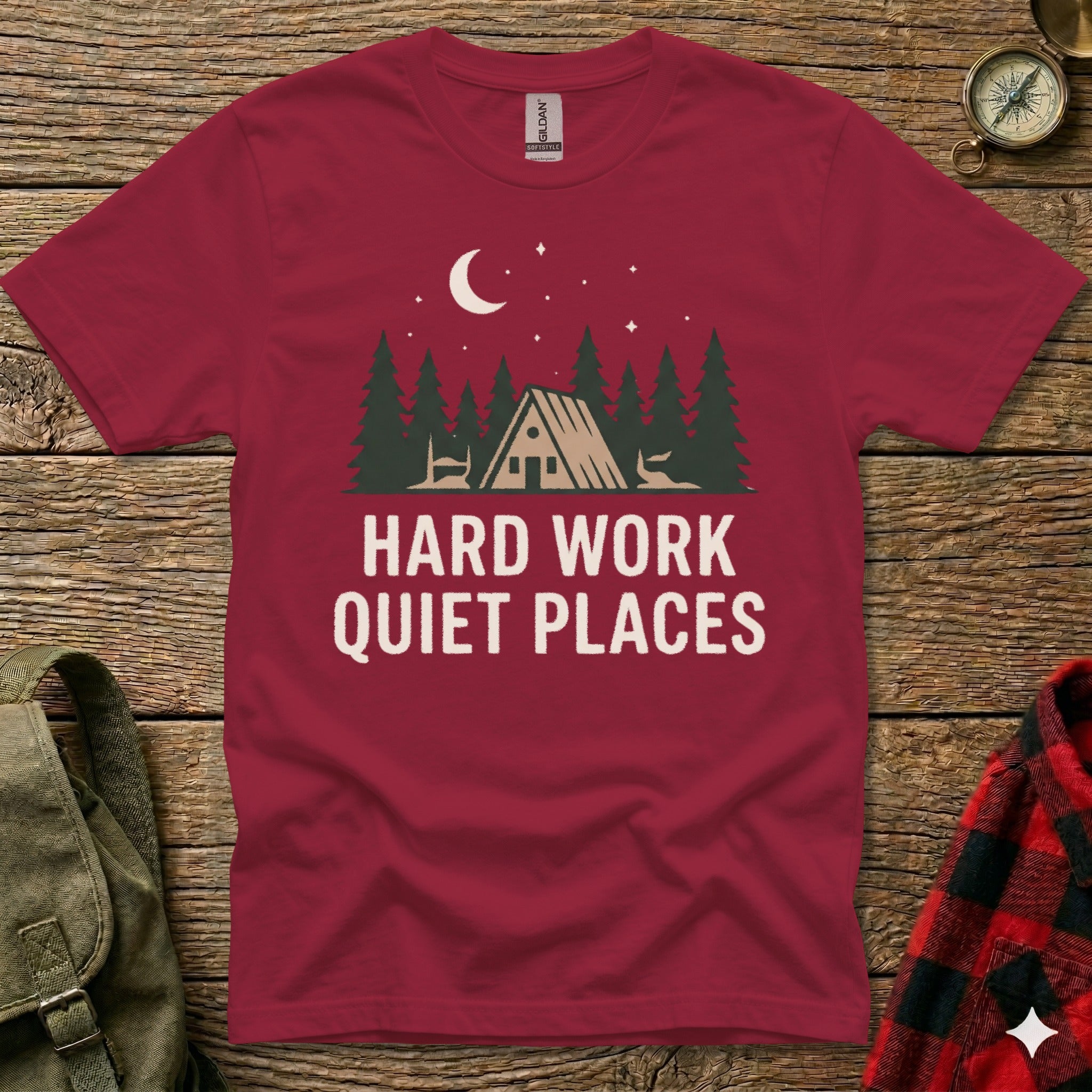 Maroon t-shirt with "Hard Work Quiet Places" text and forest design.