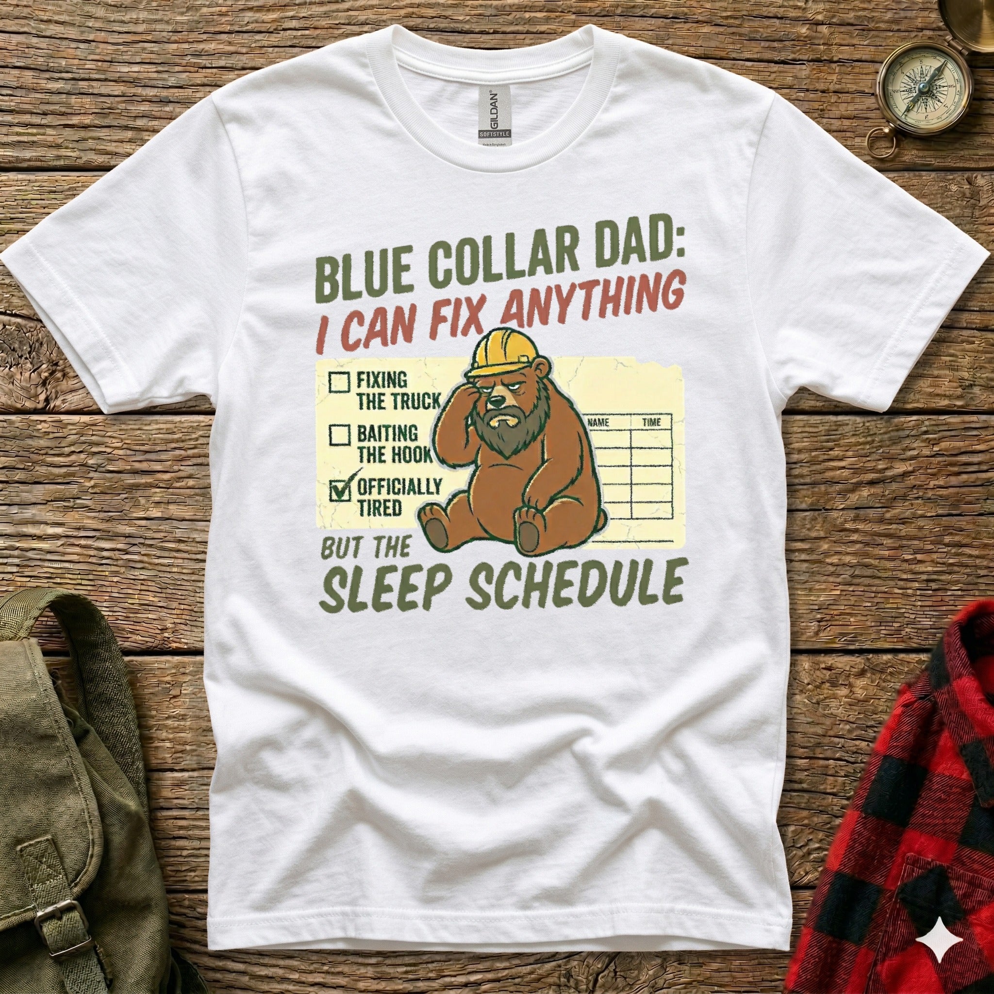 White t-shirt with "Blue Collar Dad: I Can Fix Anything" graphic featuring a bear.