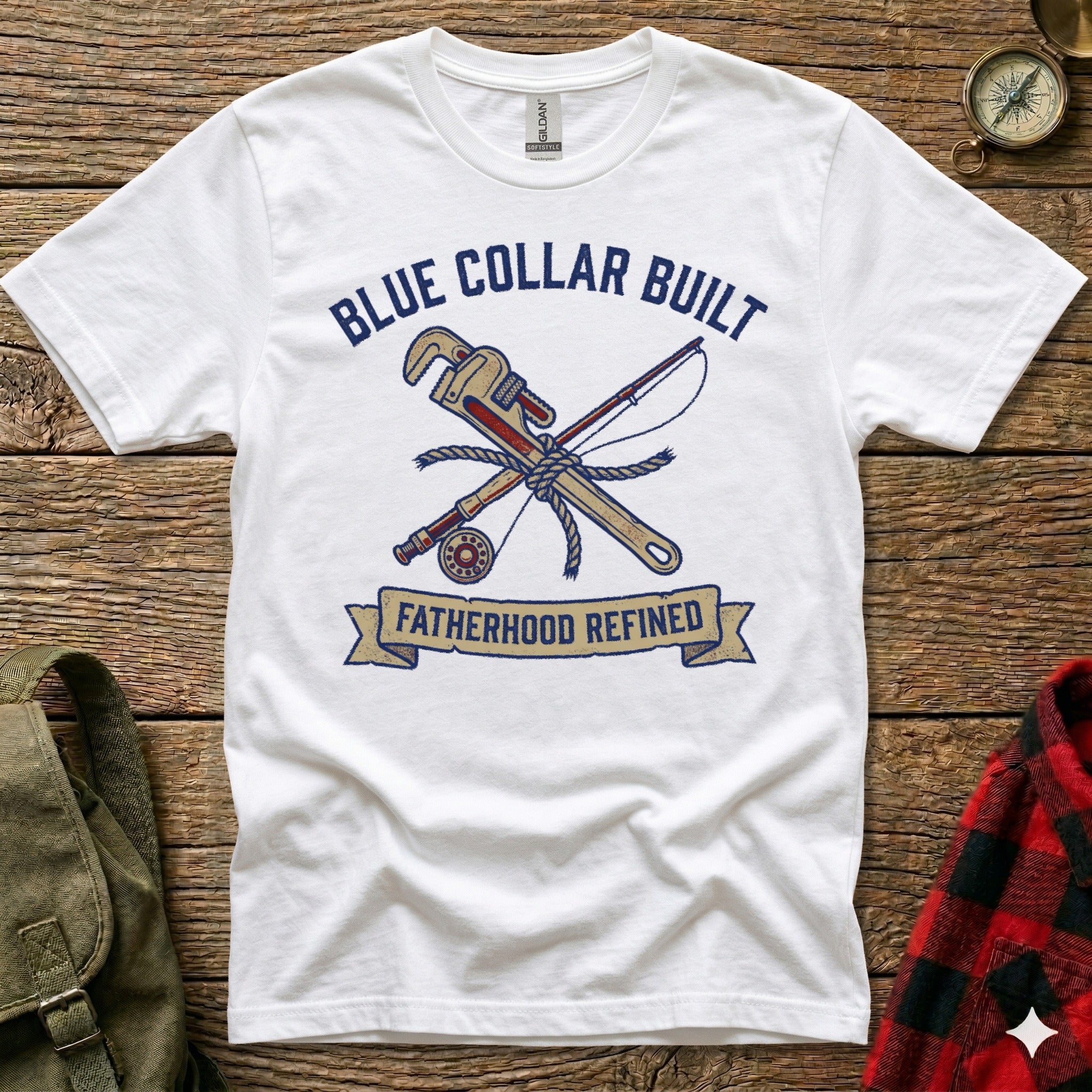 White t-shirt with "Blue Collar Built Fatherhood Refined" text and crossed wrench and fishing rod.