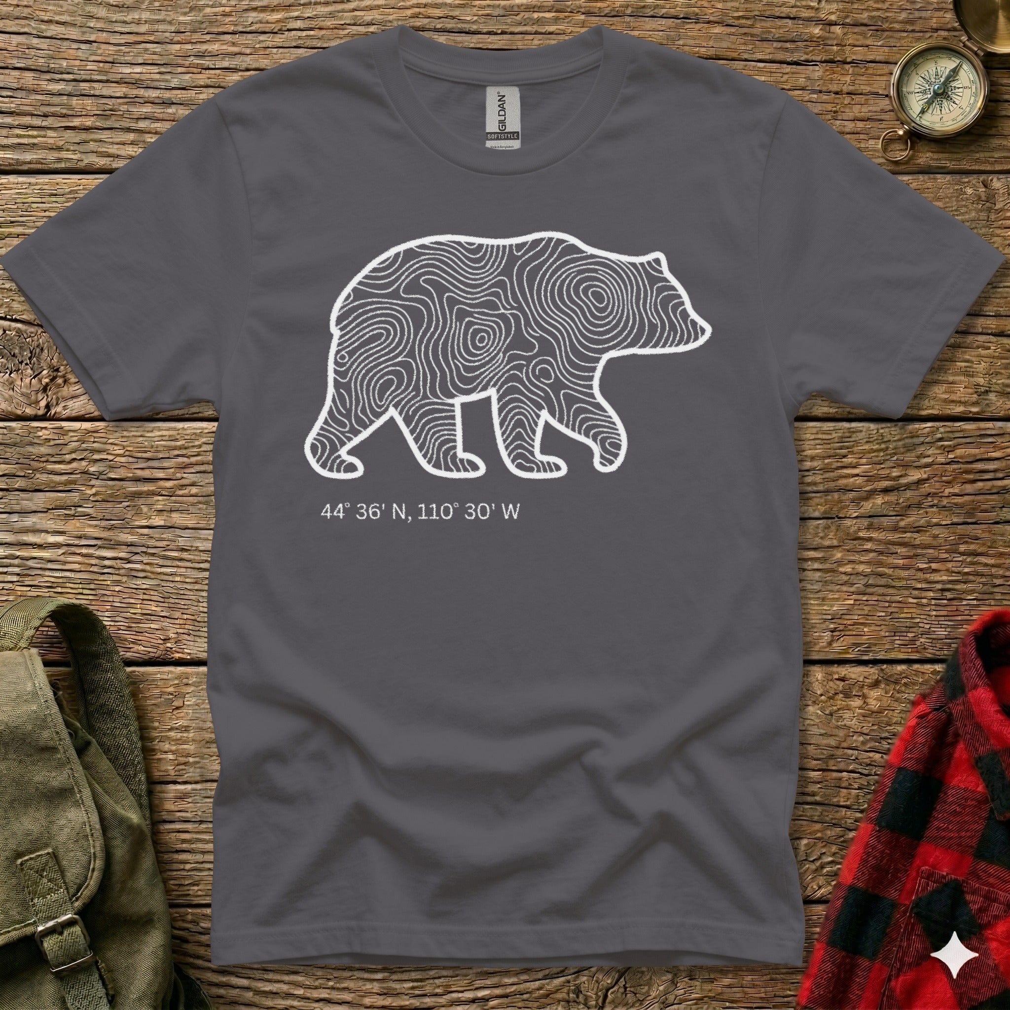 Charcoal t-shirt with a white topographic bear outline and coordinates.