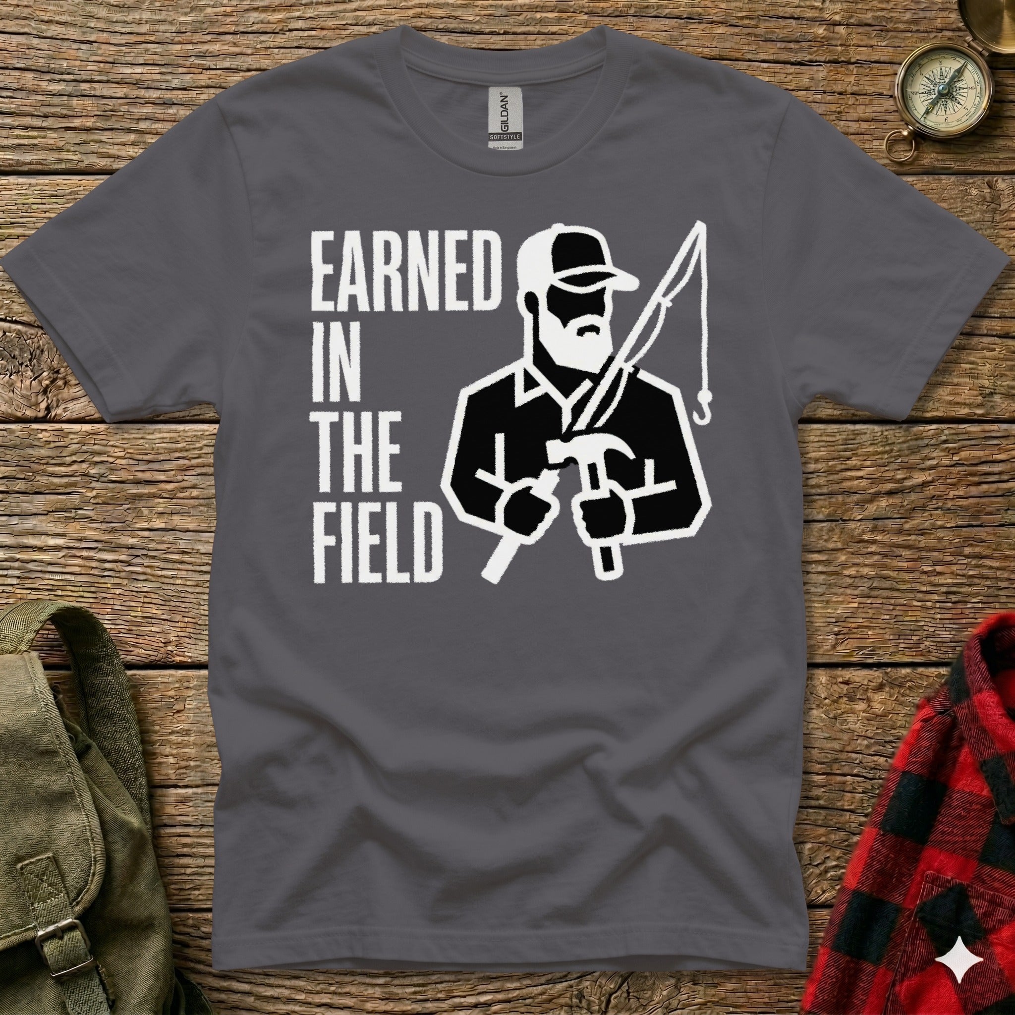 Dark grey t-shirt with white graphic of a man holding hammer and fishing rod.