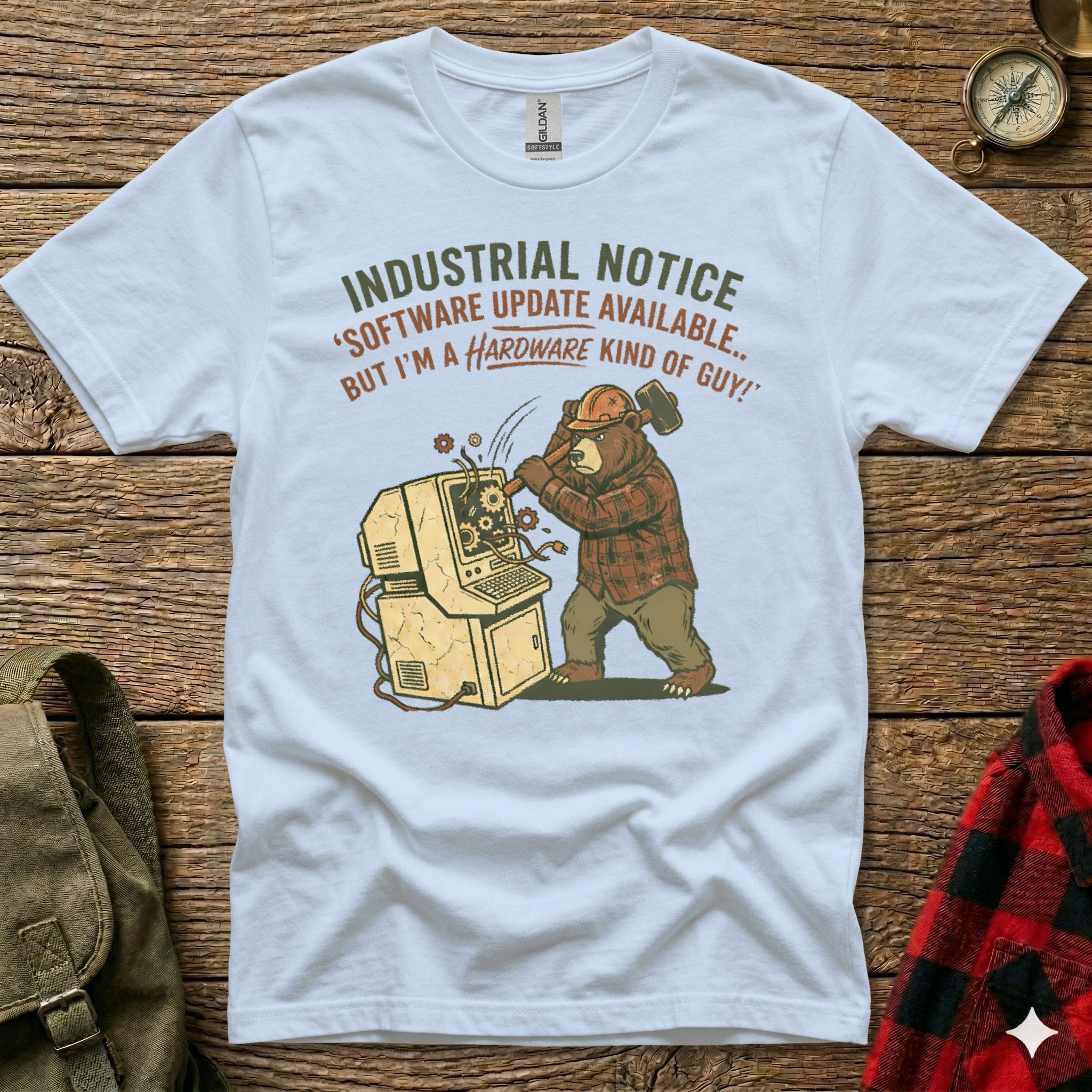 Bear with hard hat smashing vintage computer, text "Industrial notice 'Software update available...'".