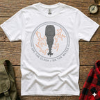 White t-shirt with a graphic of an outboard motor and text "Off the Clock / On the Water".