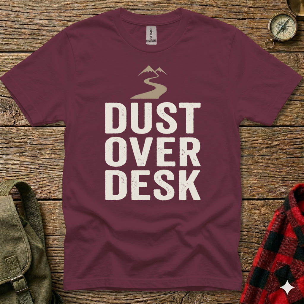 Maroon t-shirt with "Dust Over Desk" text and mountain graphic.