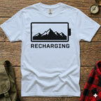 White t-shirt with black battery graphic and "Recharging" text.
