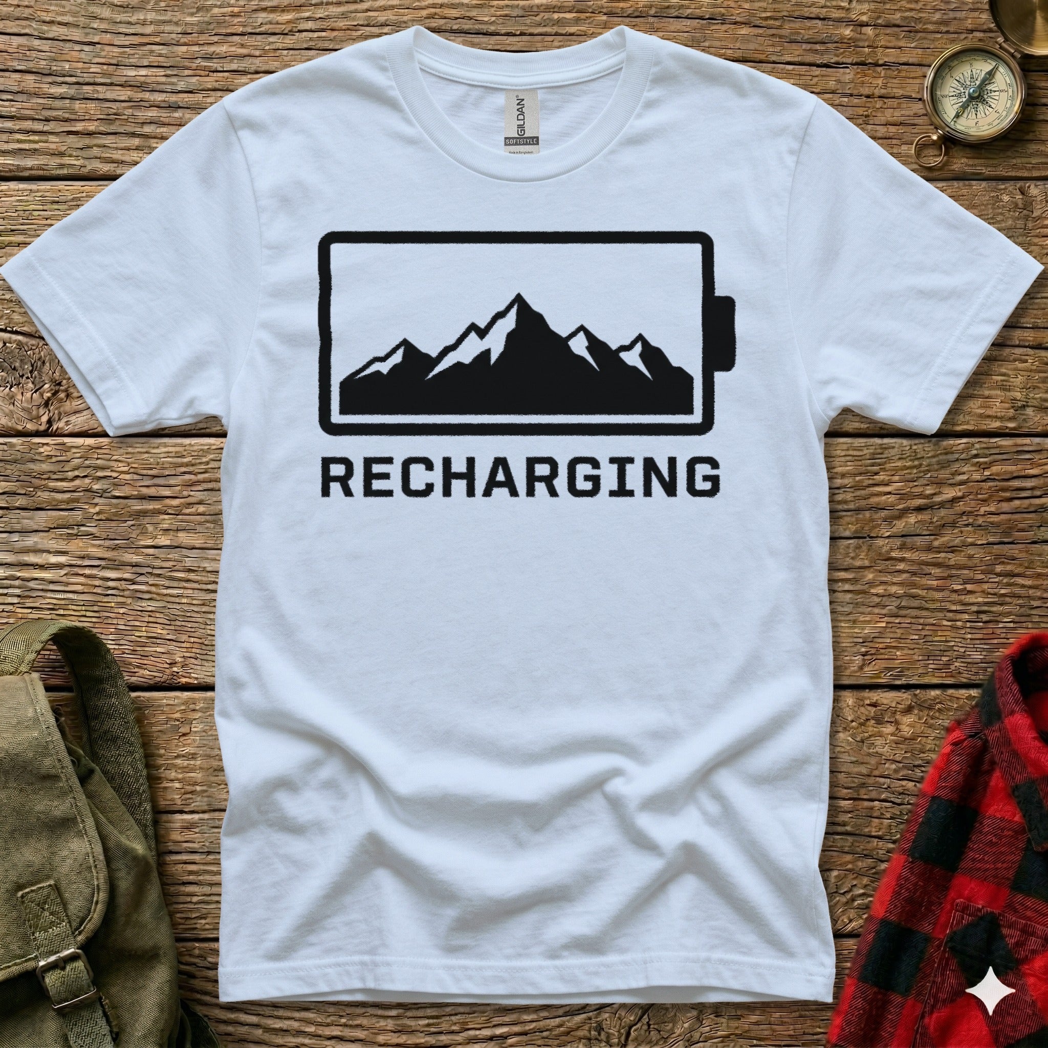 White t-shirt with black battery graphic and "Recharging" text.
