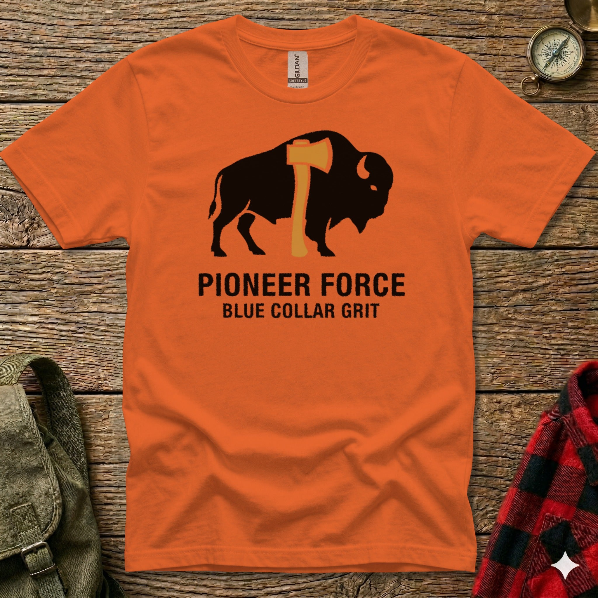 Orange t-shirt with bison and axe graphic, "PIONEER FORCE BLUE COLLAR GRIT" text.