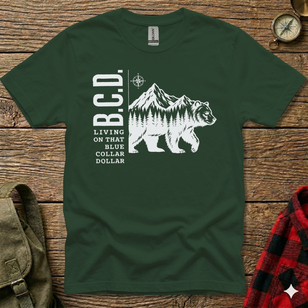 Dark green t-shirt with "B.C.D." and a bear with mountains and text "LIVING ON THAT BLUE COLLAR".