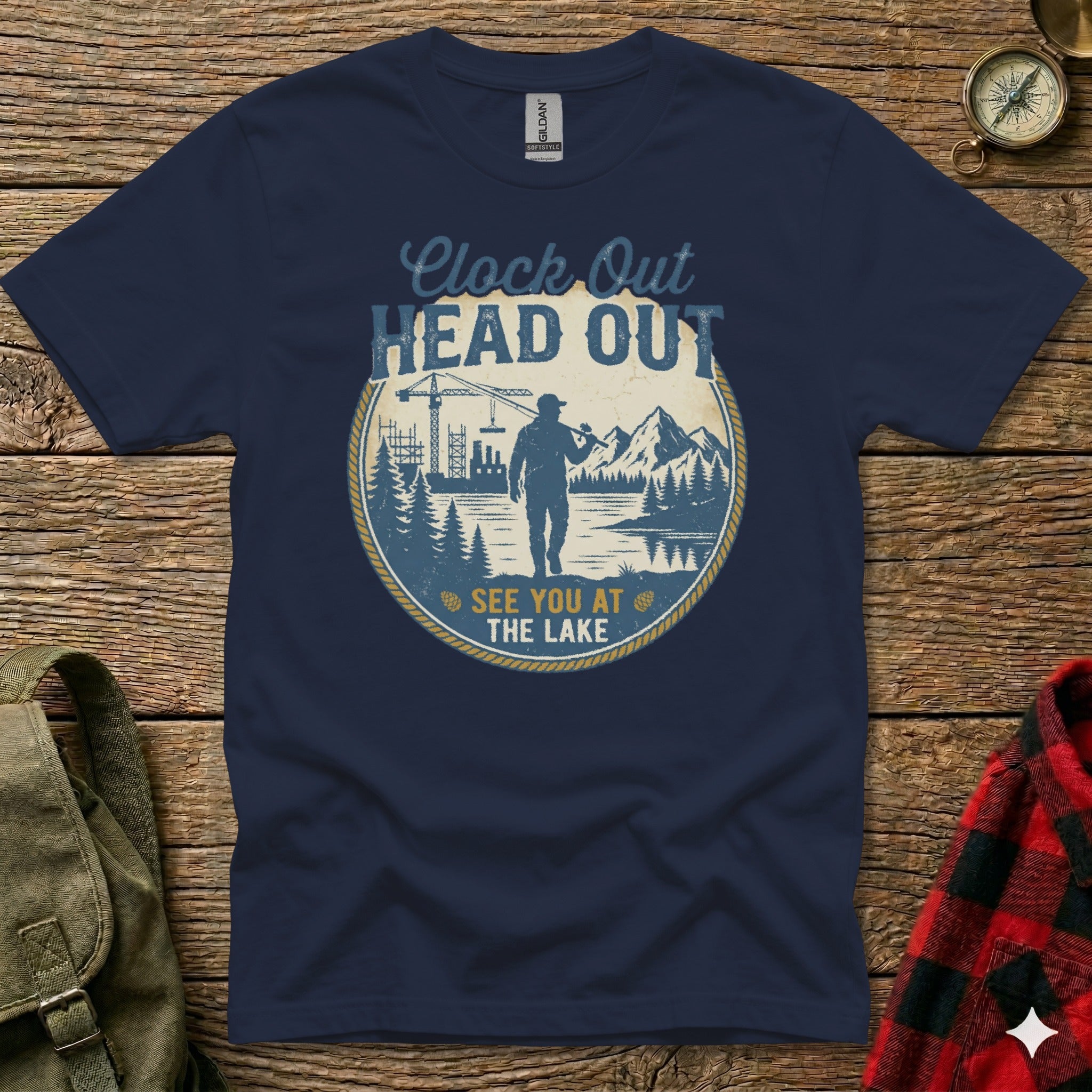 Navy t-shirt with "Clock Out, Head Out, See You At The Lake" graphic.