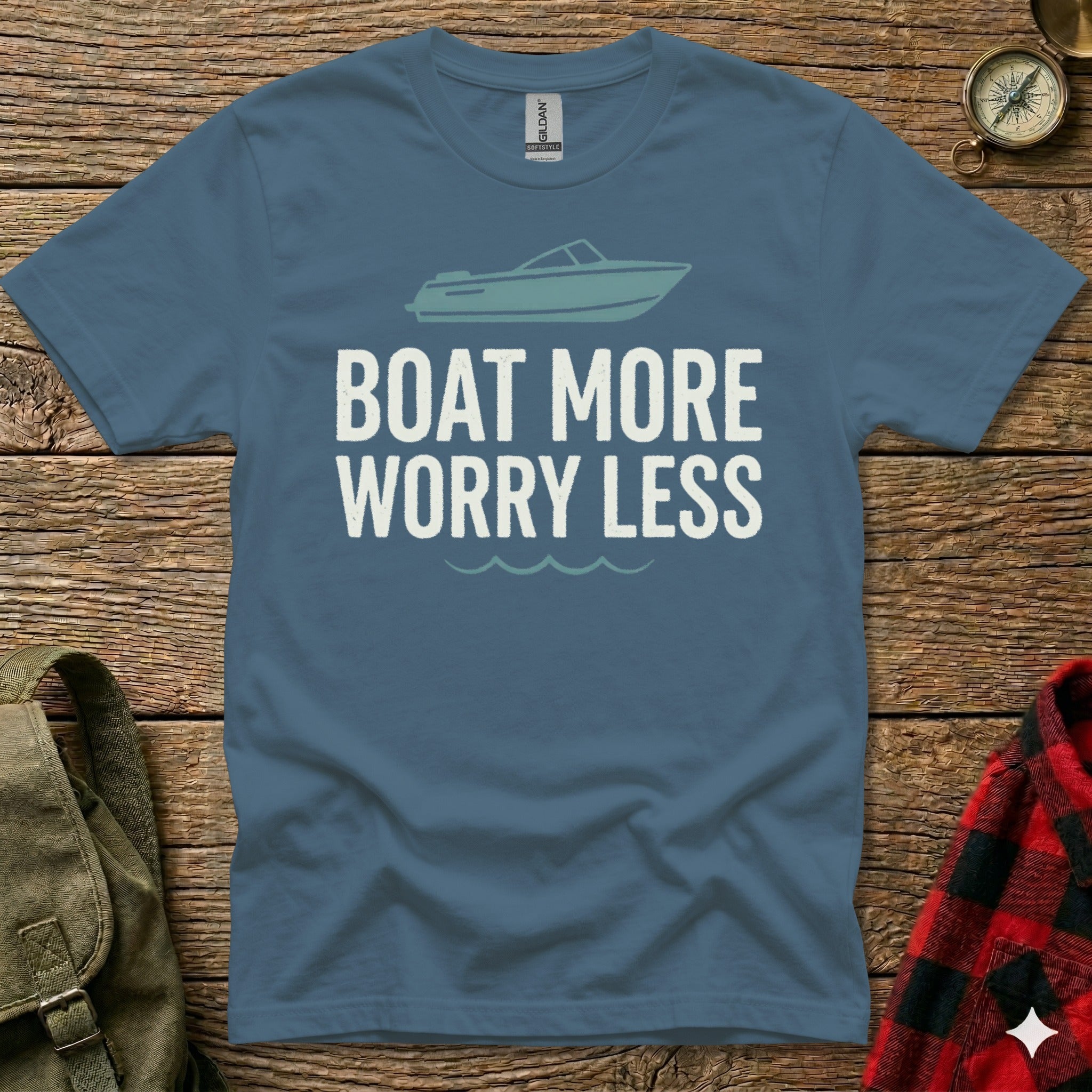 Blue t-shirt with "BOAT MORE WORRY LESS" and a boat graphic.