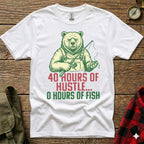 White t-shirt with cartoon bear holding fishing rod, text "40 HOURS OF HUSTLE... 0 HOURS OF FISH".