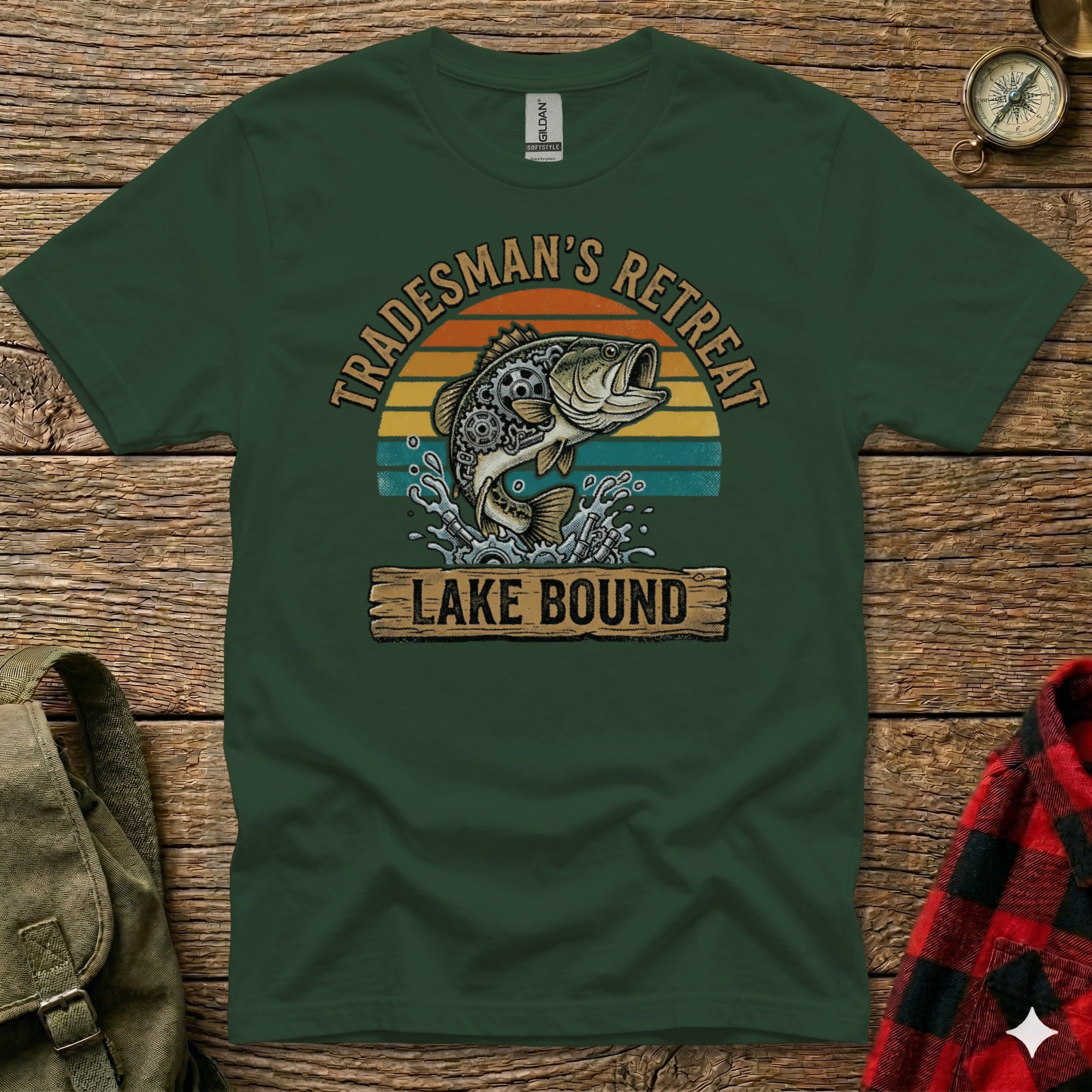 Green t-shirt with "Tradesman's Retreat Lake Bound" text and a jumping bass.