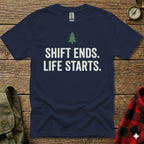 Navy t-shirt with white text "SHIFT ENDS. LIFE STARTS." and a green tree graphic.
