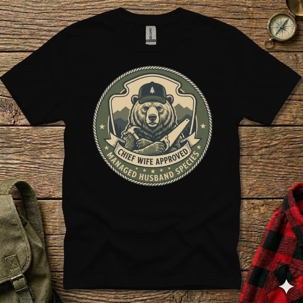 Bear wearing a hat and holding a saw, "Chief Husband Approved" text.