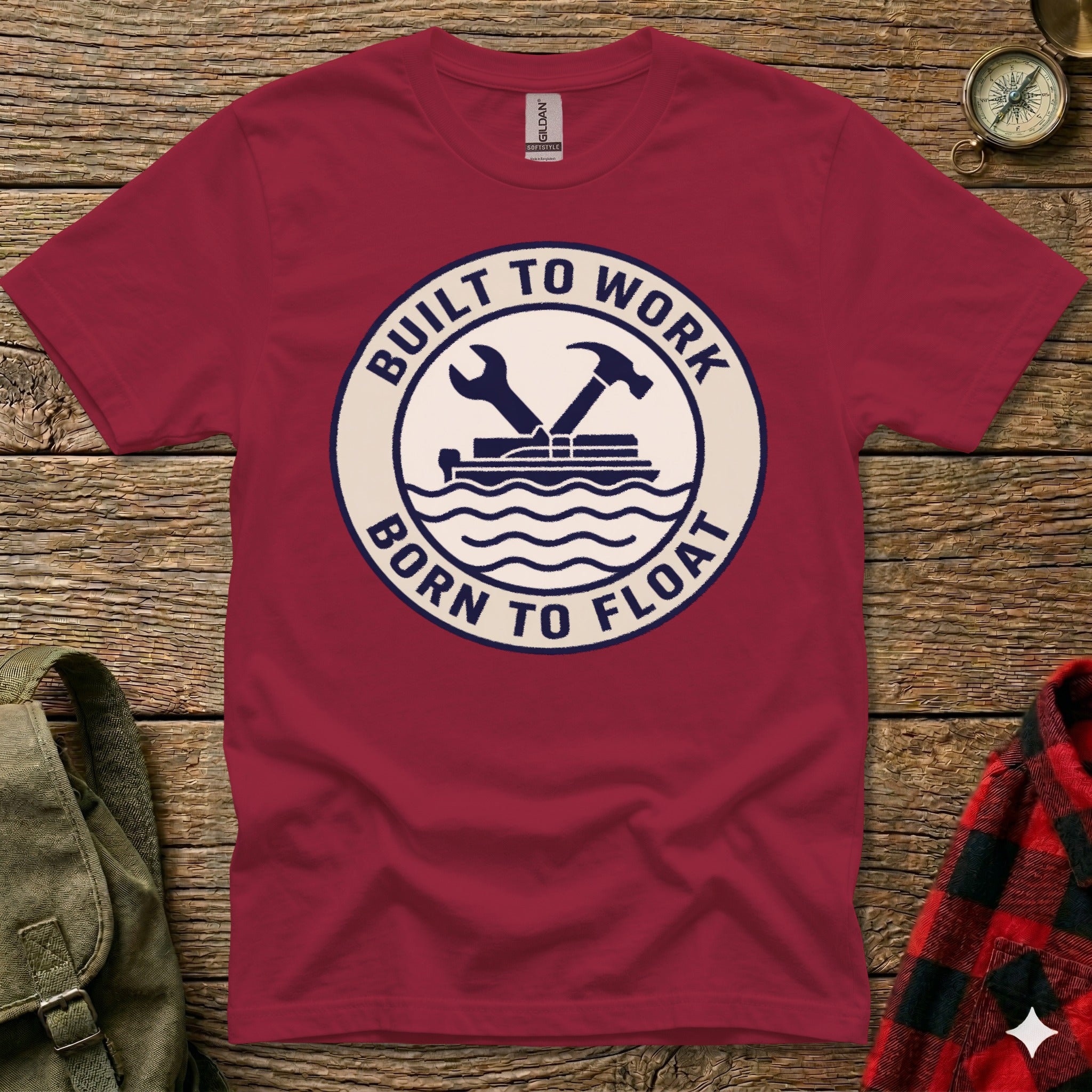 Burgundy t-shirt with "Built to Work, Born to Float" text and wrench graphic.