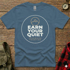 Blue t-shirt with circular logo: "EARN YOUR QUIET IRONWOOD FRONTIER".