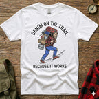 T-shirt with a hiker carrying a large backpack, text reads "DENIM ON THE TRAIL BECAUSE IT WORKS."