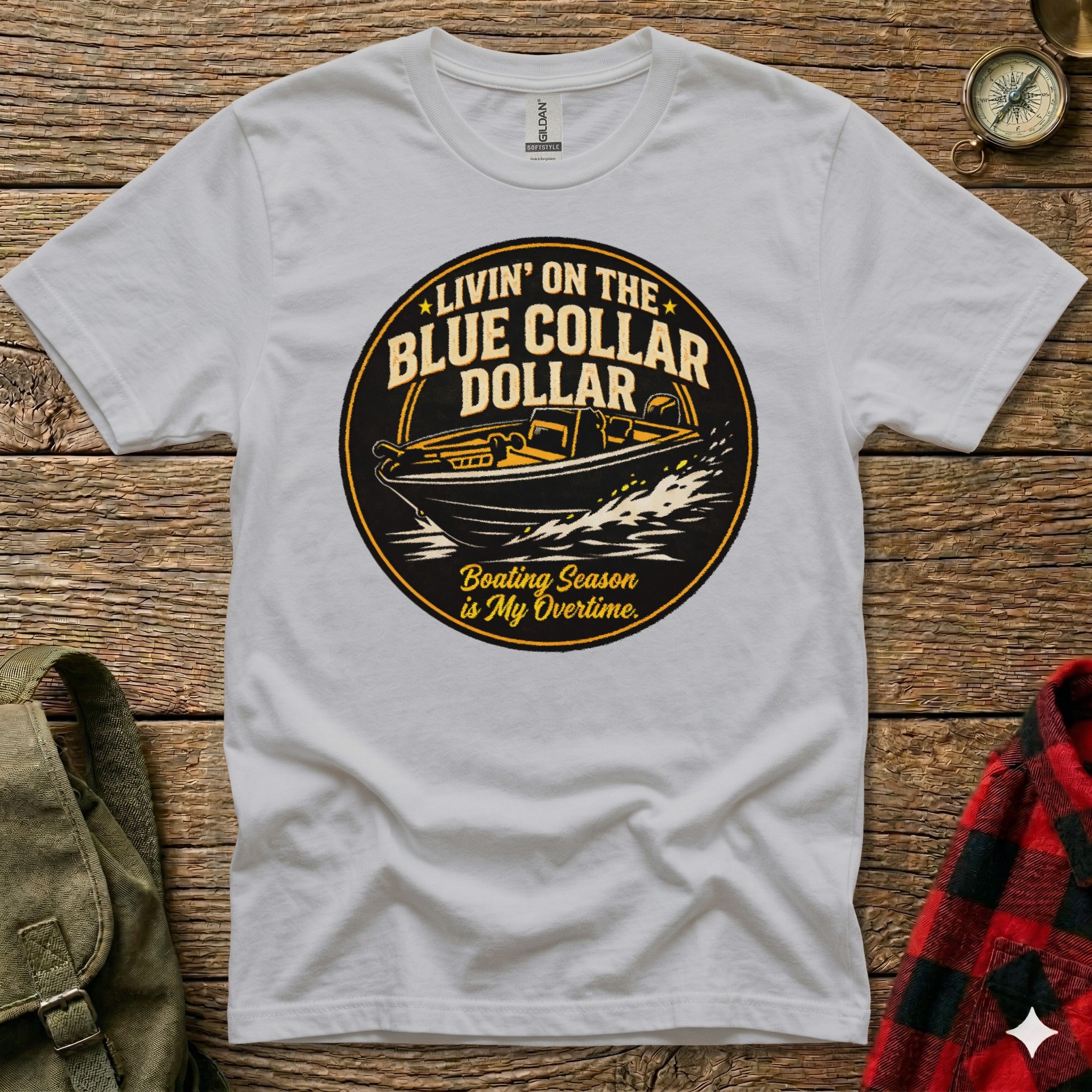 T-shirt with circular logo featuring a boat and text "Livin' on the Blue Collar Dollar."