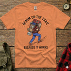 Illustration of hiker with backpack and text "DENIM ON THE TRAIL BECAUSE IT WORKS".