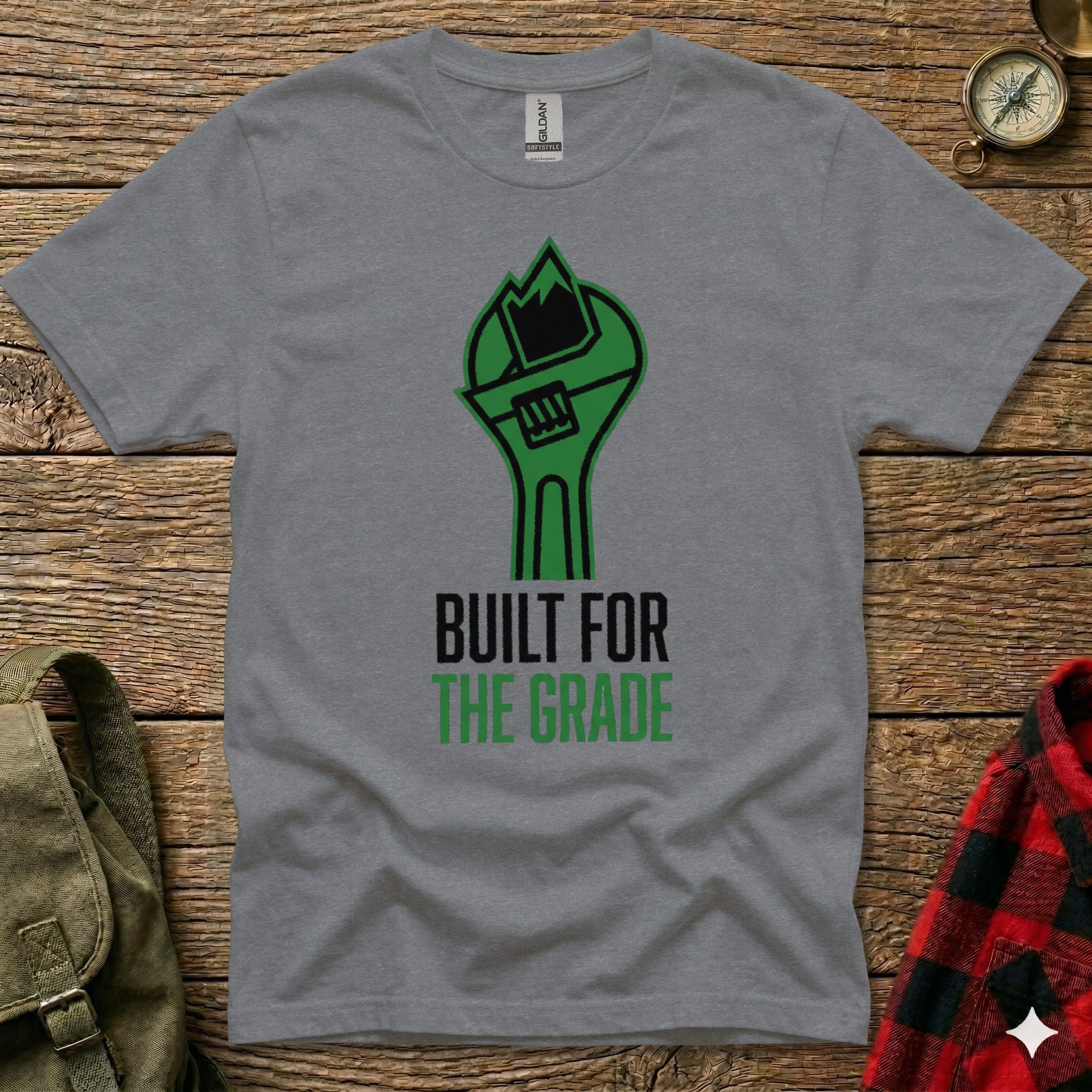 Grey t-shirt with green wrench logo and "Built for the Grade" text.