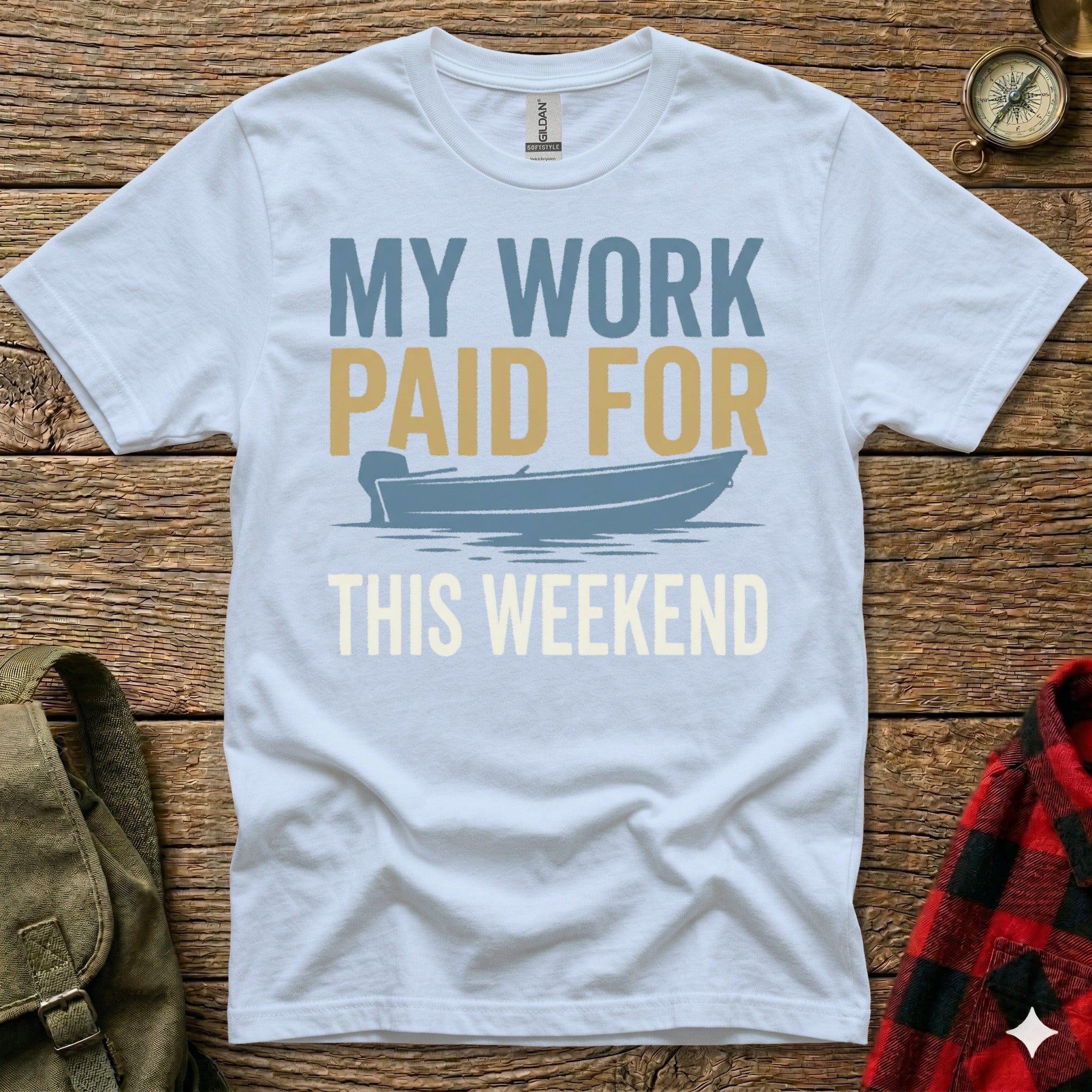 Light blue t-shirt with "MY WORK PAID FOR THIS WEEKEND" and a boat graphic.