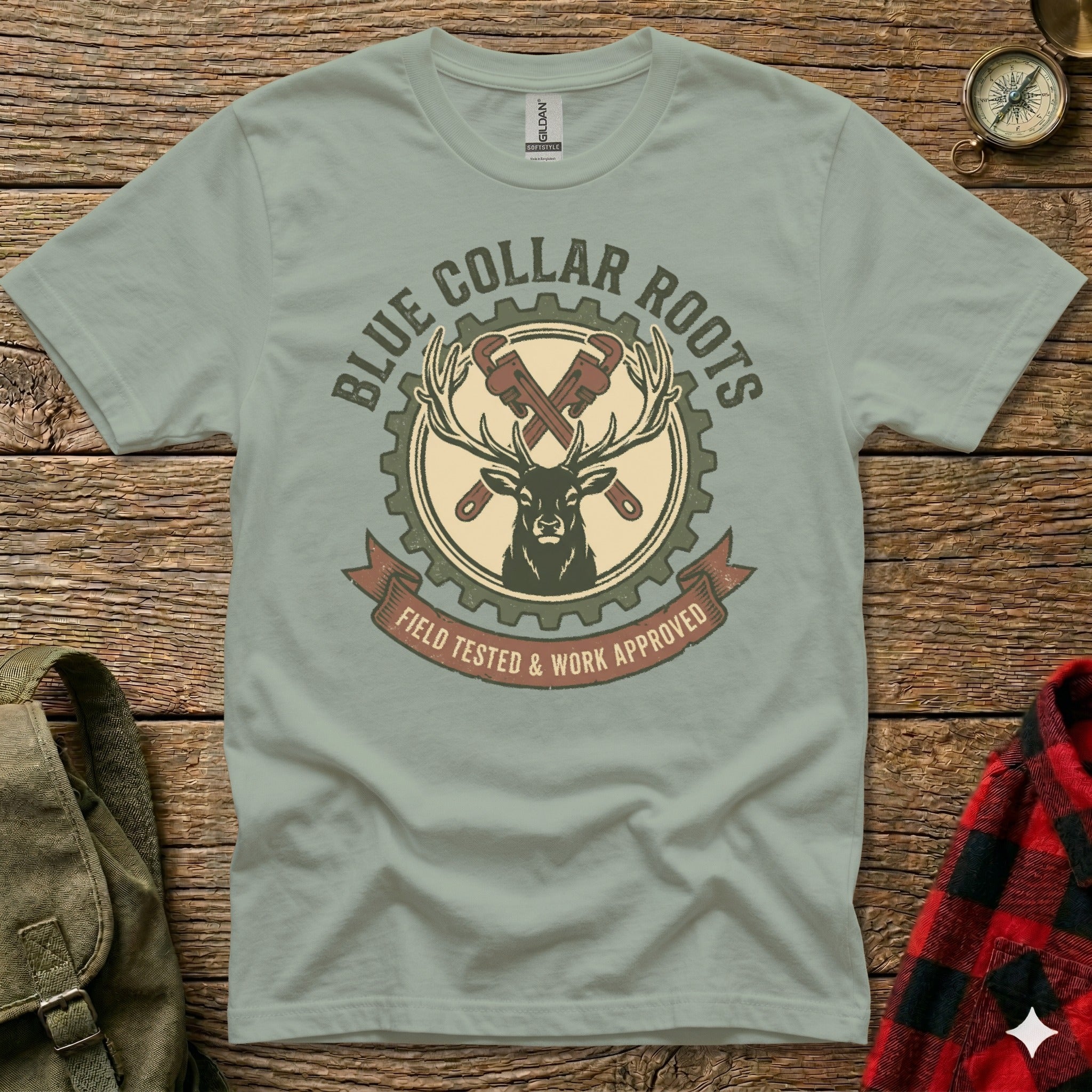 Green t-shirt with "Blue Collar Roots" logo featuring a deer and crossed wrenches.