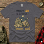 Dark grey t-shirt with "I WORK 40 TO SURVIVE" and "I TRESPASS TO THRIVE" text.