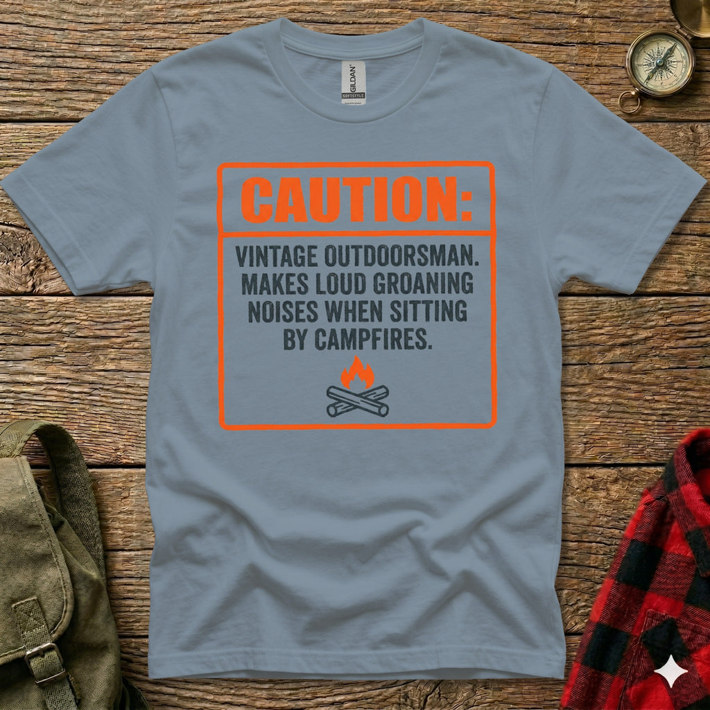 Grey t-shirt with "Caution Vintage Outdoorsman" text and campfire graphic.
