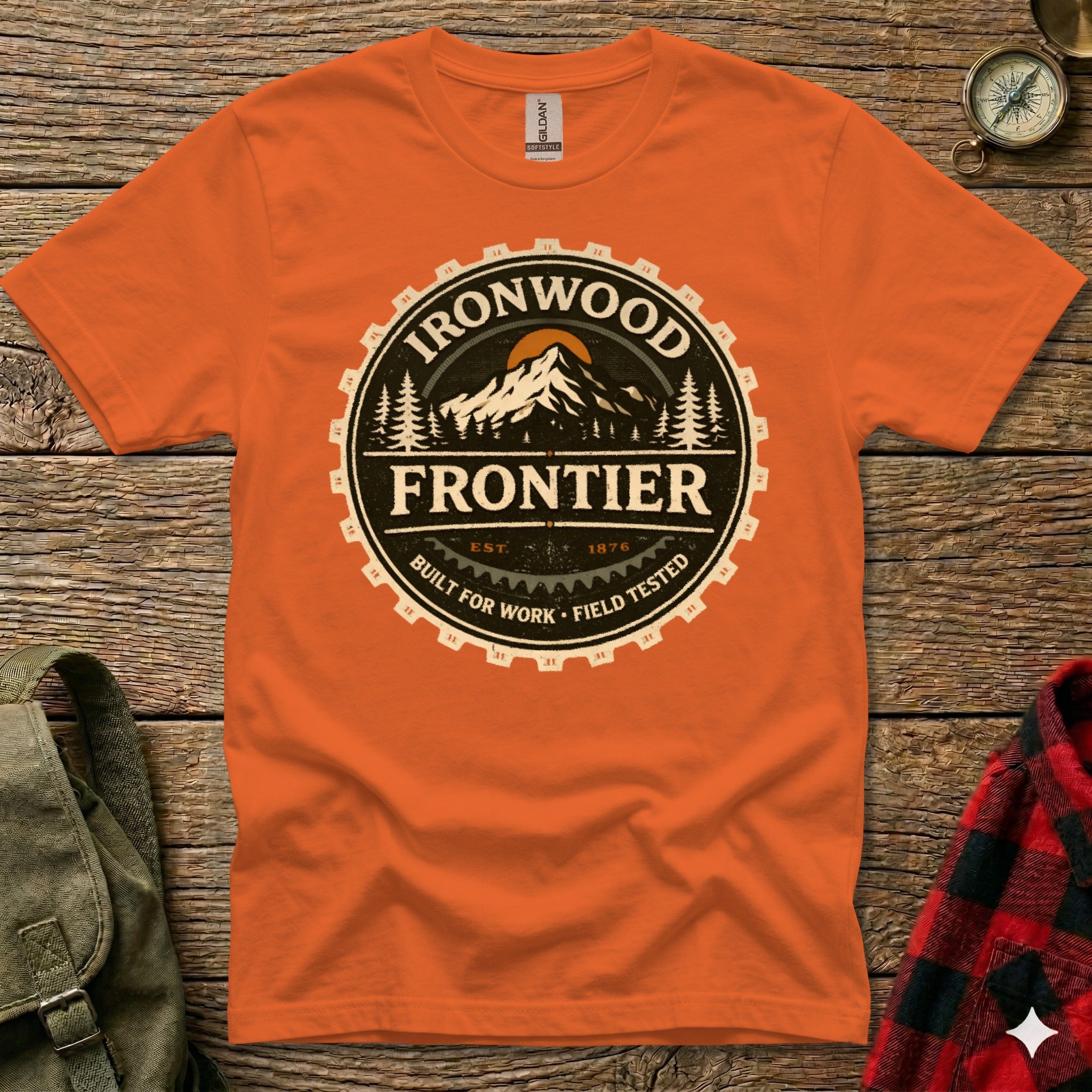 Orange t-shirt with circular "Ironwood Frontier Built for Work Field Tested" graphic.