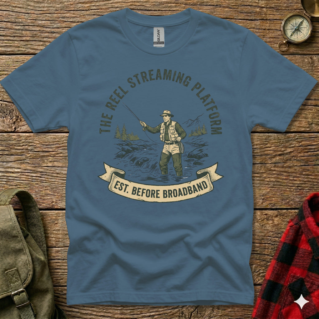 Blue t-shirt with fishing graphic and "The Reel Streaming Platform Est. Before Broadband".