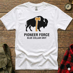 White t-shirt with black buffalo silhouette holding an axe, "PIONEER FORCE BLUE COLLAR GRIT".