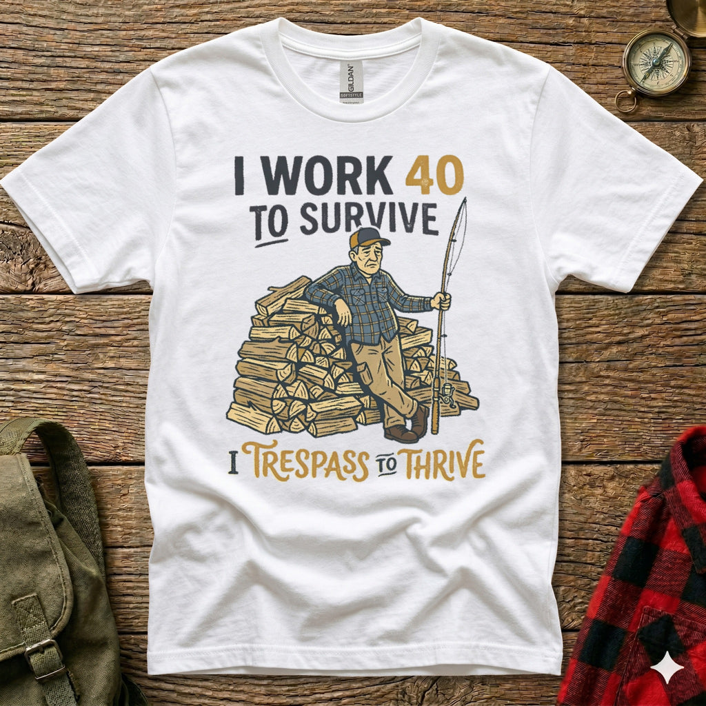 White t-shirt with text and graphic of a man by a woodpile holding a fishing rod.