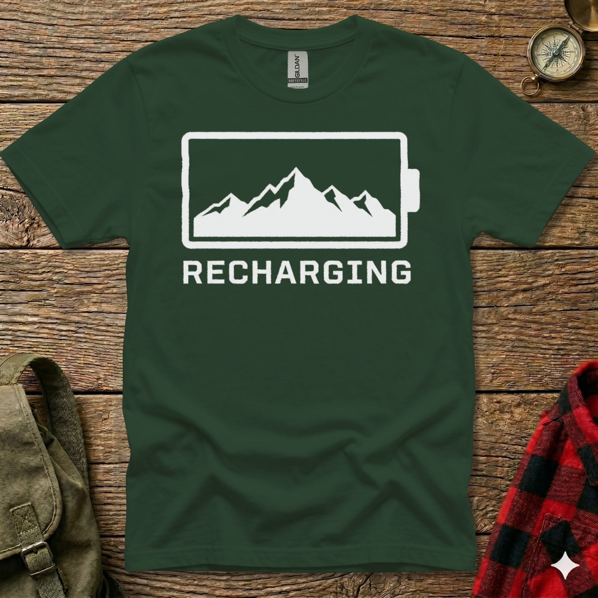 Green t-shirt with "RECHARGING" and mountain silhouette within a battery icon.