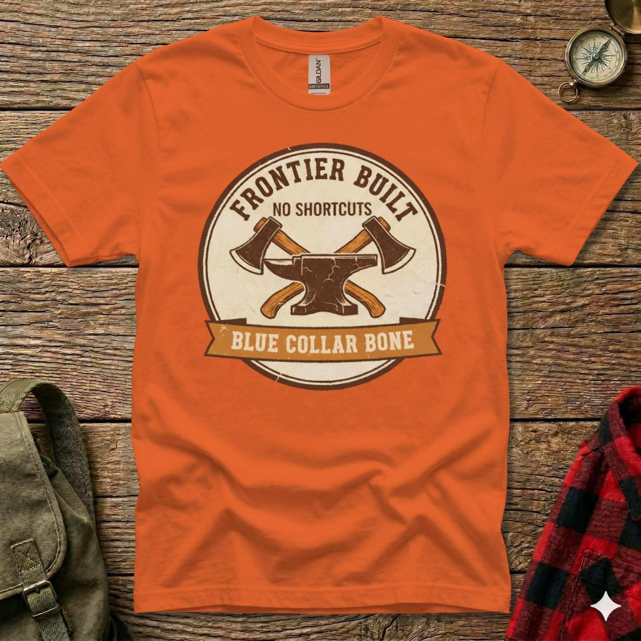 Orange t-shirt with "Frontier Built No Shortcuts Blue Collar Bone" graphic.
