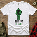 White t-shirt with green wrench graphic and text "BUILT FOR THE GRADE".