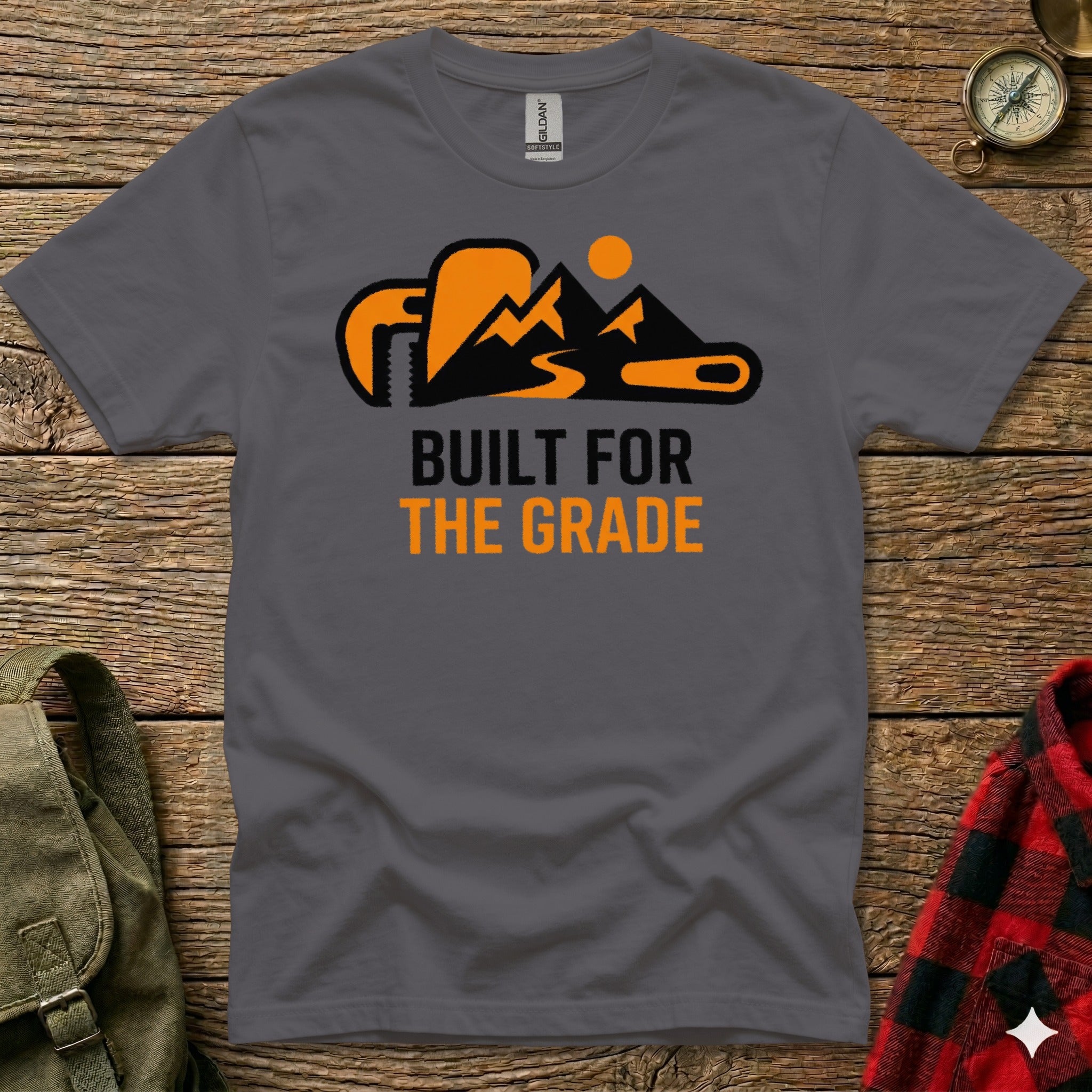 Gray t-shirt with "BUILT FOR THE GRADE" and mountain graphic.