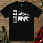 Black t-shirt with white bear silhouette, mountains, and text "B.C.D. Living on That Blue Collar".