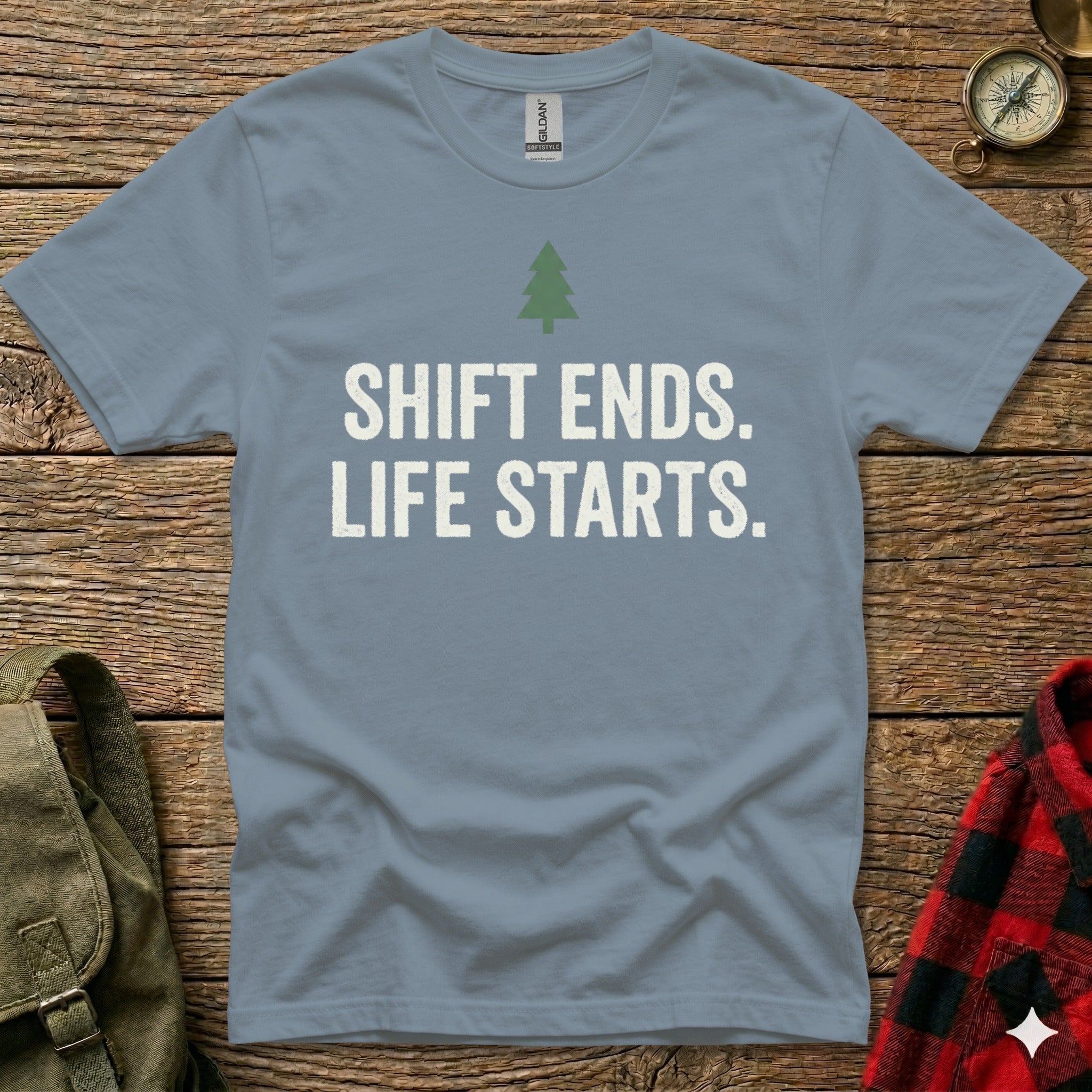 Gray t-shirt with "SHIFT ENDS. LIFE STARTS." text and a small green pine tree.