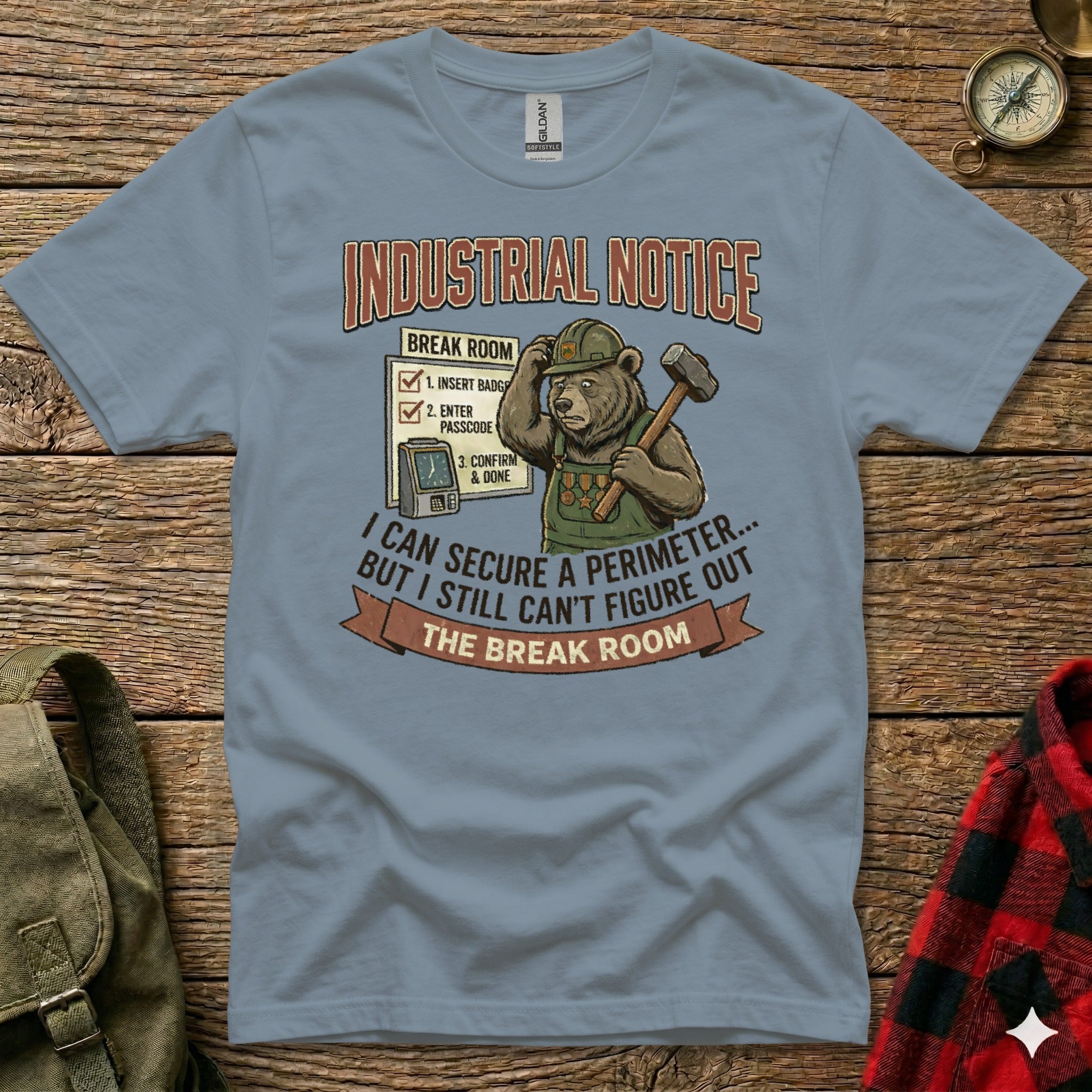 T-shirt with graphic of bear in hard hat, hammer, and break room notice.