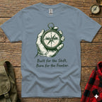 Grey t-shirt with compass graphic and text "Built for the Shift, Born for the Frontier."