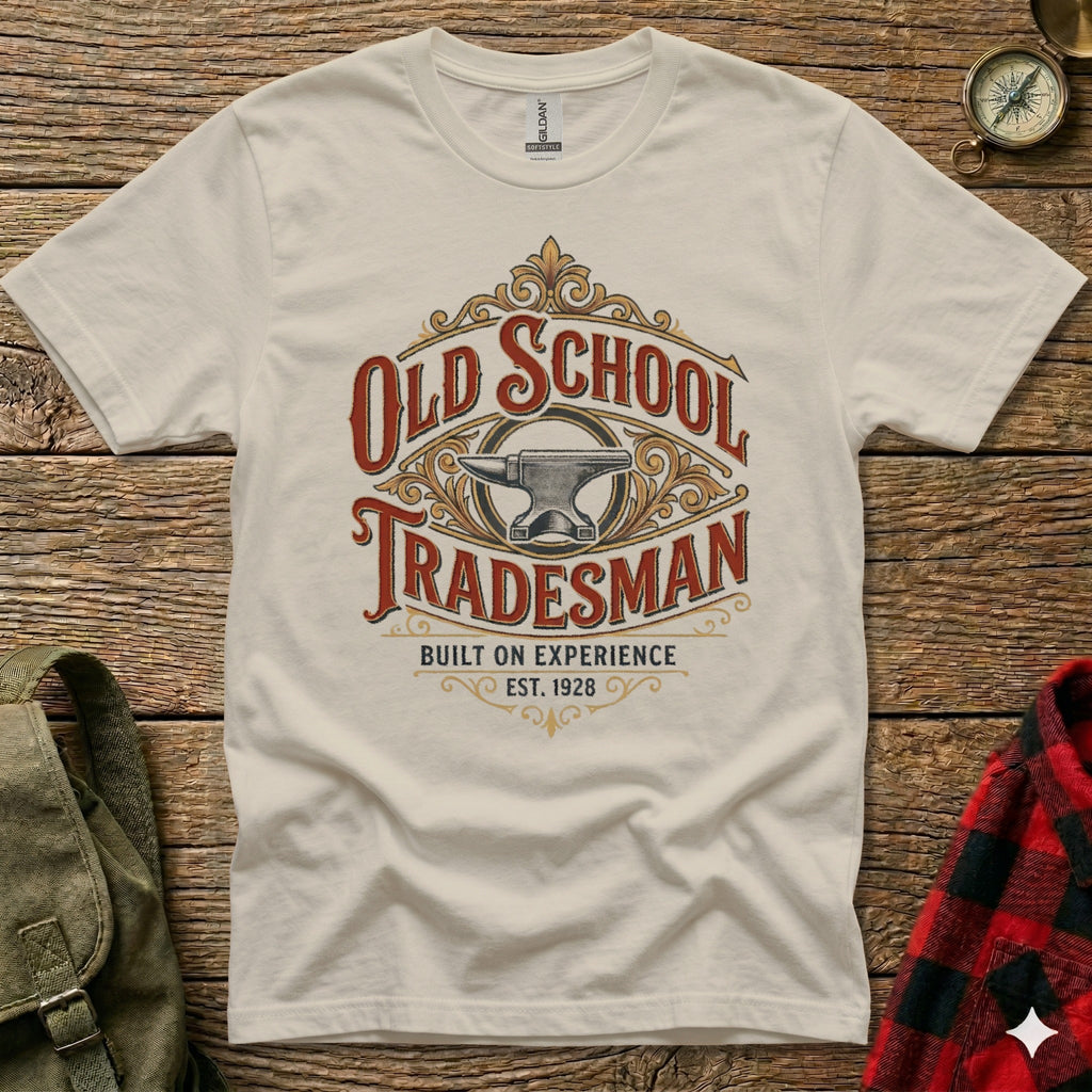 Cream t-shirt with "Old School Tradesman Built on Experience Est. 1928" text and anvil graphic.